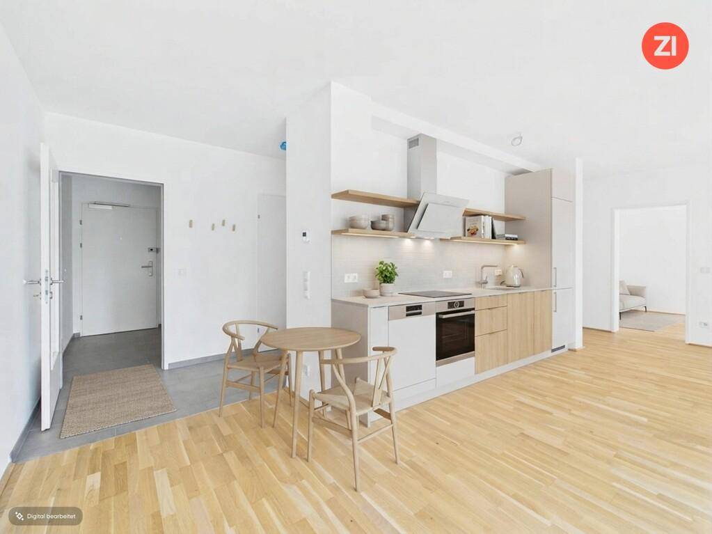 Moderne Einbauküche mit Holzelementen, integrierten Geräten und kleinem Essbereich in offenem Wohnkonzept.