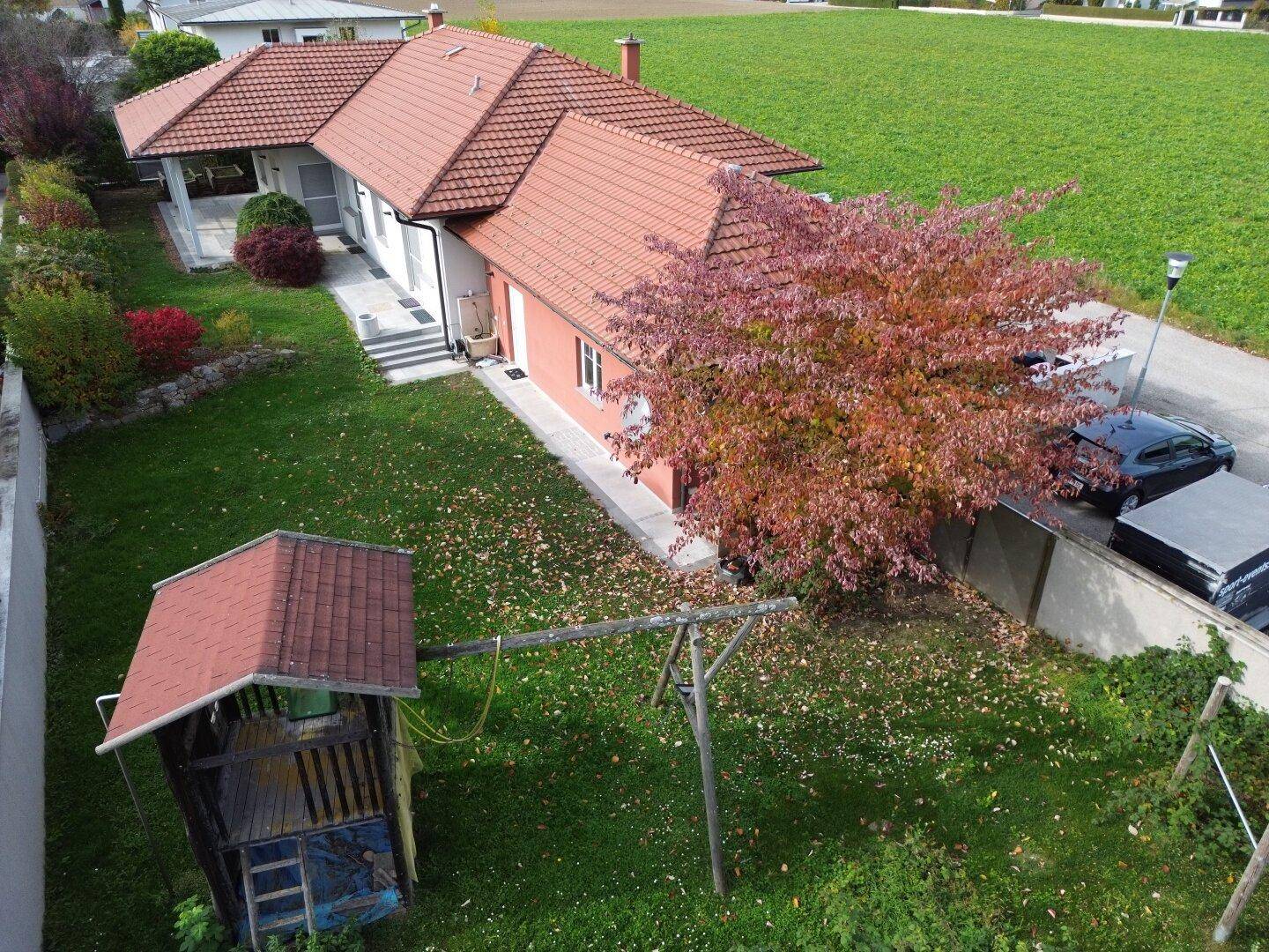 NEUER PREIS! Leistbarer Traum-Bungalow mit Kachelofen überdachter Terrasse, Gartenoase, Wohnkeller und Doppelgarage im Laahfeld /Ansfelden - Ansicht 4