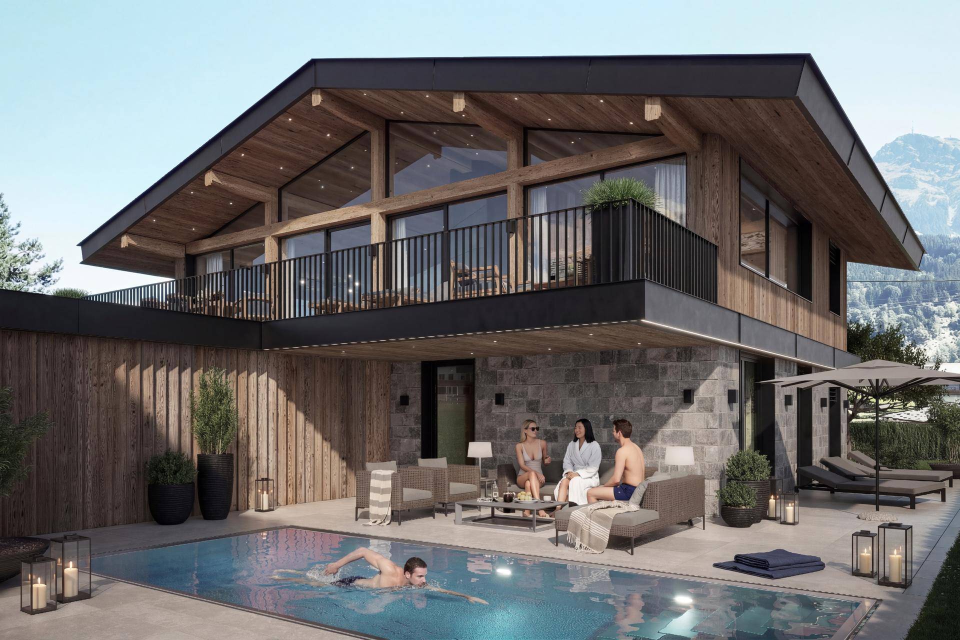 Luxuriöser Außenbereich mit Pool, Liegeflächen und gemütlicher Sitzecke vor alpiner Kulisse.