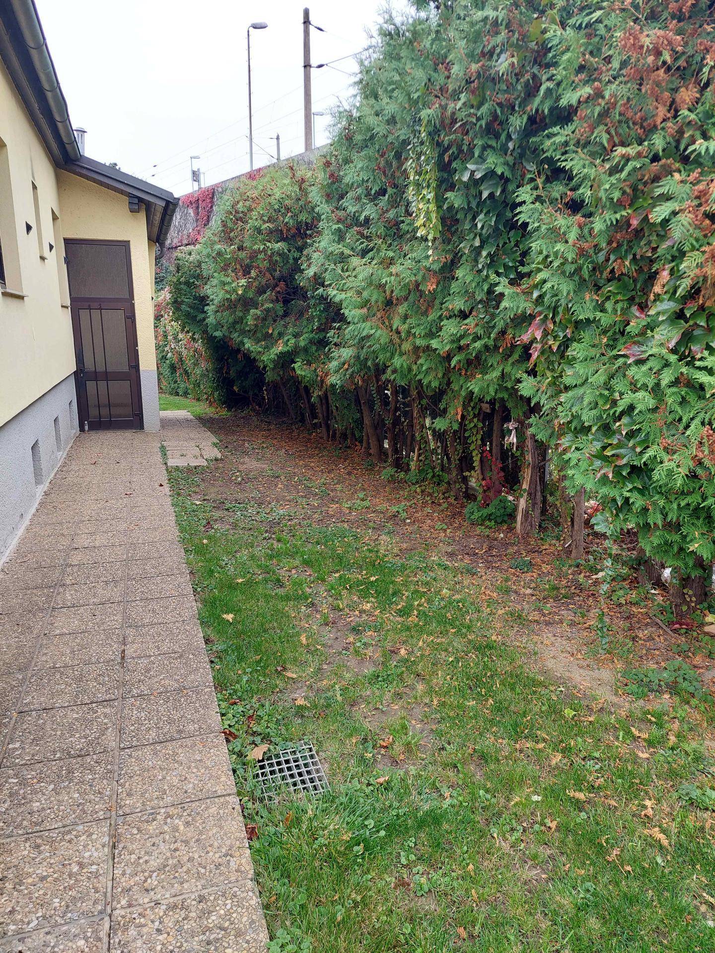 Nettes Einfamilienhaus mit großem Garten - Ansicht 3