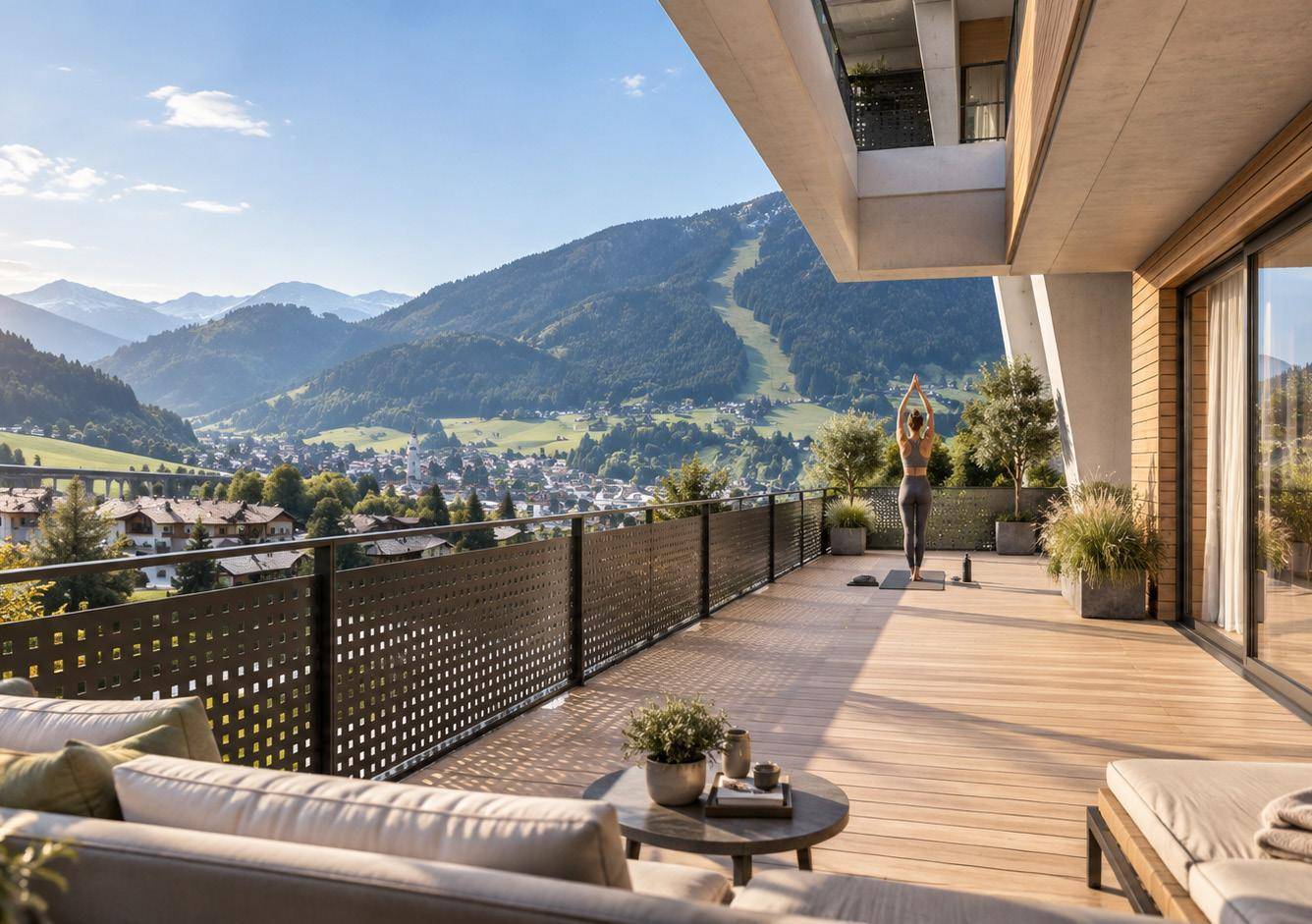 Geräumige Terrasse mit Holzboden, Sitzgelegenheiten und atemberaubendem Bergblick in die Ferne.