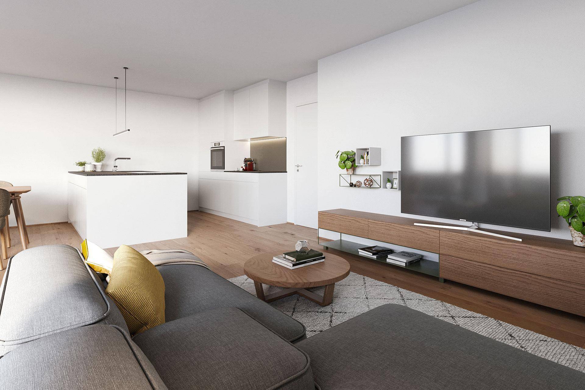 Heller, offener Wohnbereich mit moderner Küche, Holzboden und gemütlichem Sofa.