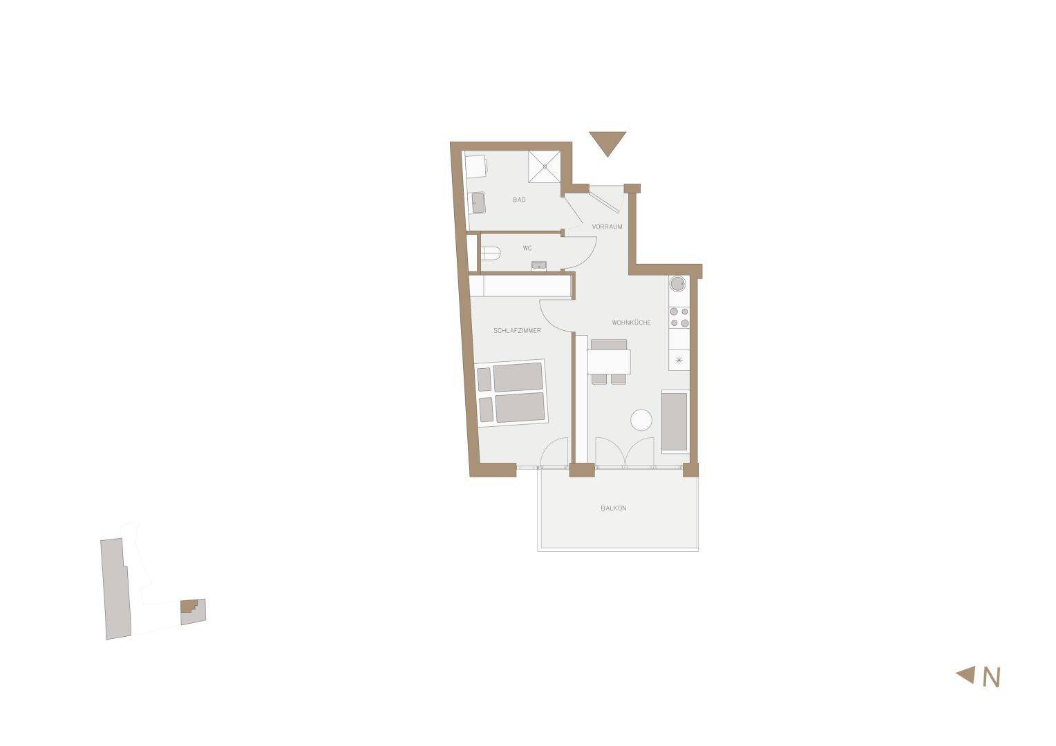 Grundriss einer Wohnung mit Schlafzimmer, Bad, Wohnküche und Balkon.
