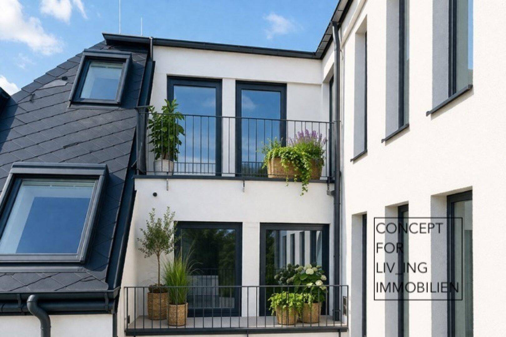 Moderne Gebäudefassade mit Balkonen, Dachfenstern und schiefergedecktem Dach.