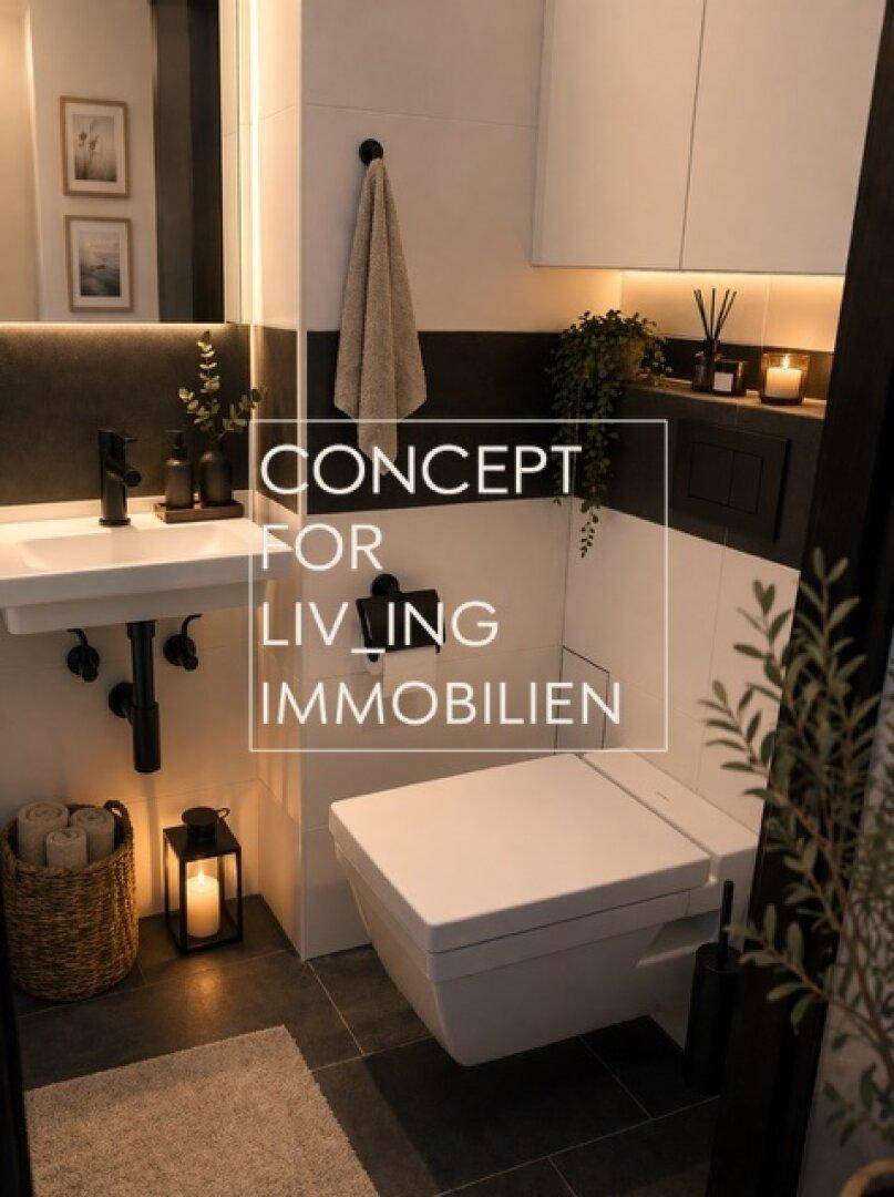 Modernes Gäste-WC mit wandhängender Toilette, kleinem Waschbecken und dunklem Fliesenboden.