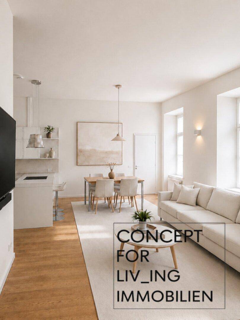 Geräumiger Wohn-Essbereich mit offener Küche, hellem Sofa und Holzboden.