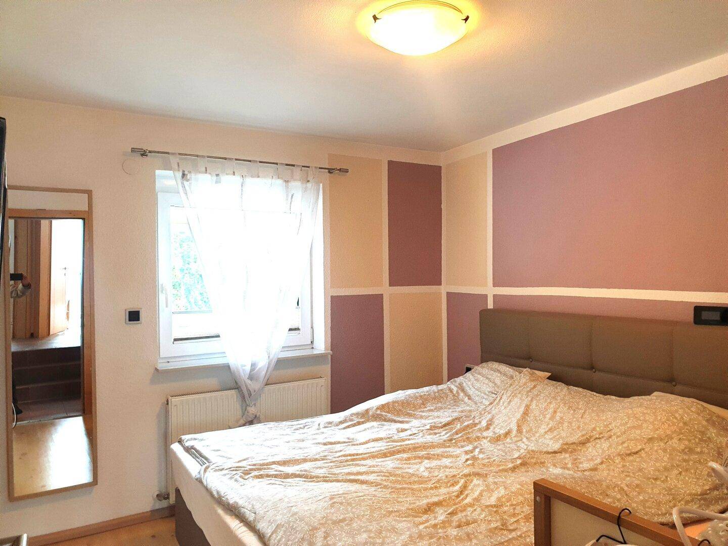 Elternschlafzimmer mit begehbarem Kleiderraum