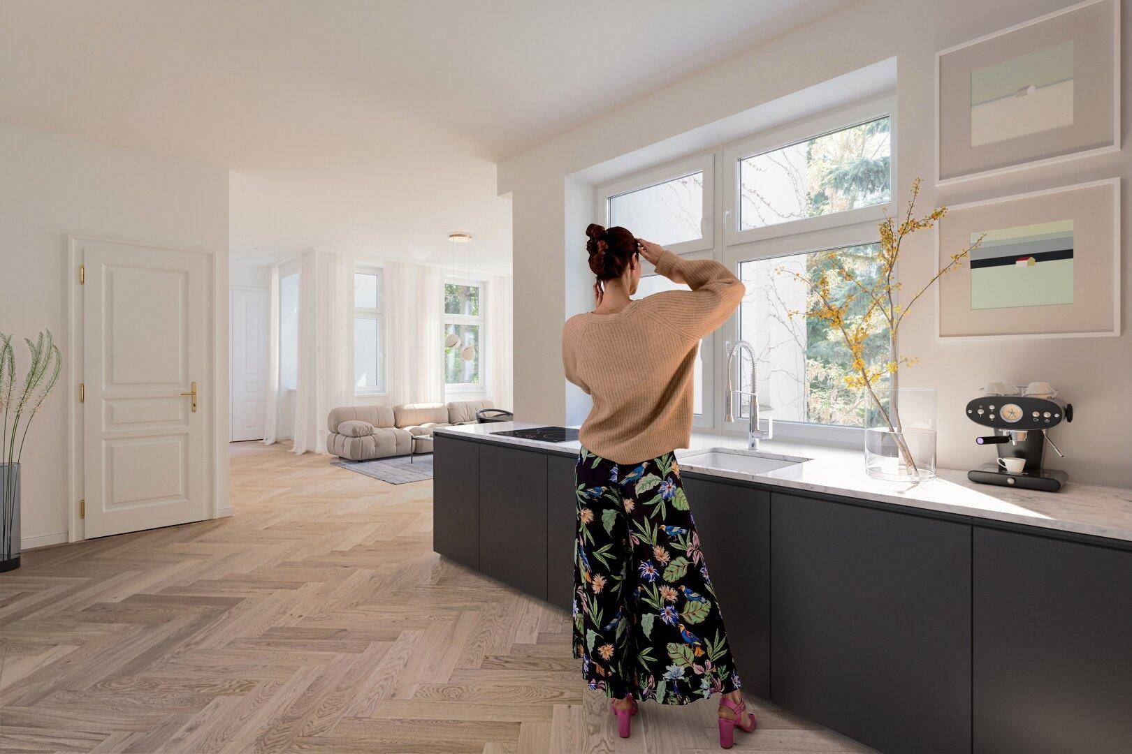 Geräumiger Wohn-Essbereich mit modularem Sofa, dunklem Teppich und elegantem Fischgrätparkett.
