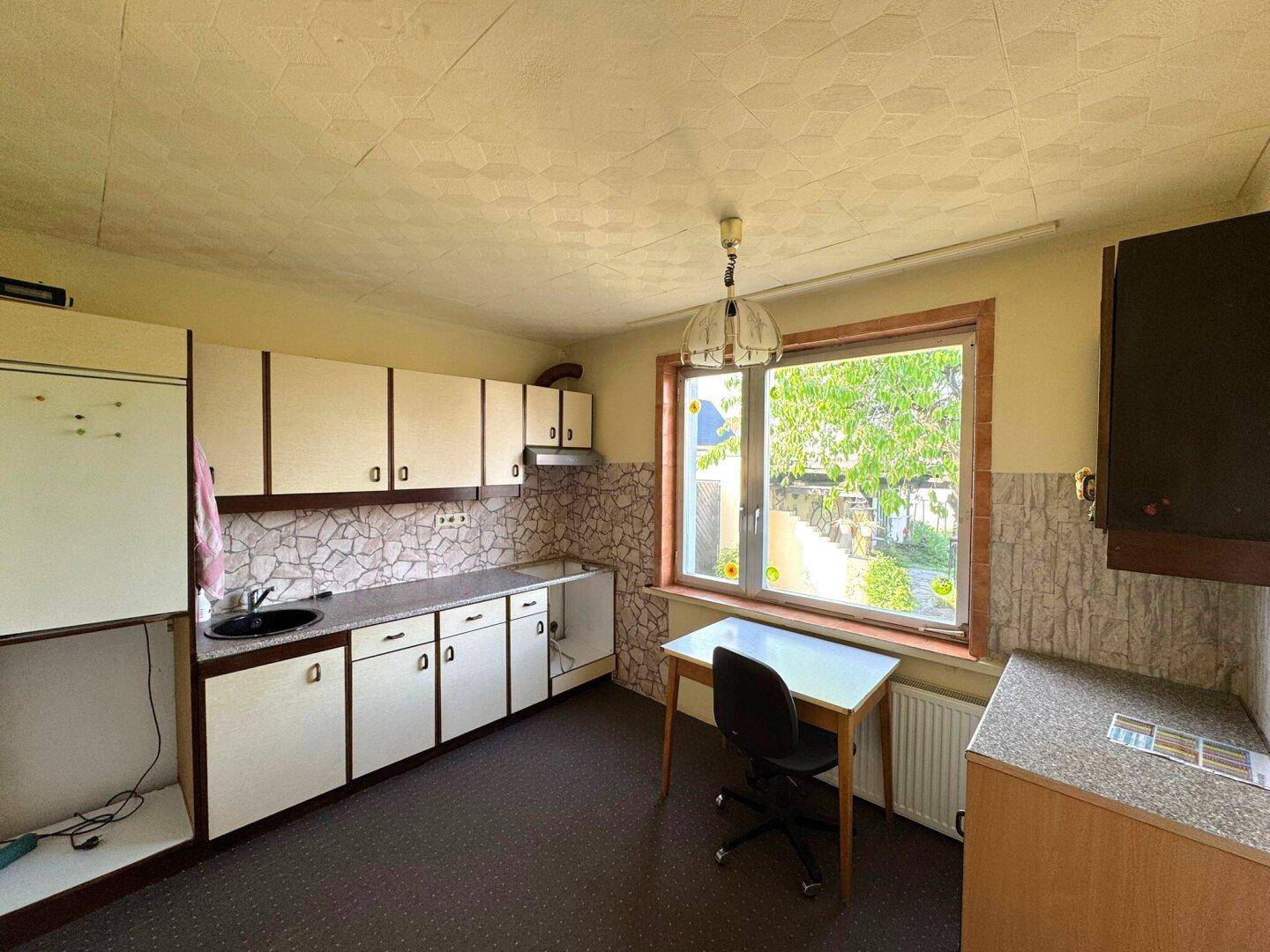 Charmantes Einfamilienhaus mit Garten in Neunkirchen – Sanierungsprojekt mit Potenzial! - Widok 4