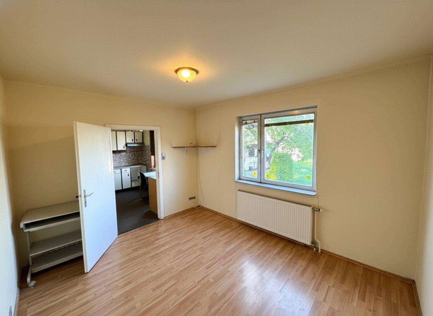 Charmantes Einfamilienhaus mit Garten in Neunkirchen – Sanierungsprojekt mit Potenzial! - Widok 3