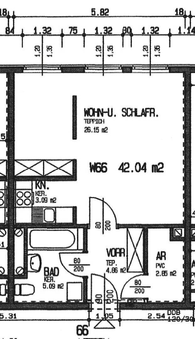 Grundriss einer Wohnung mit Wohn- und Schlafbereich, Küche, Bad und Vorraum.