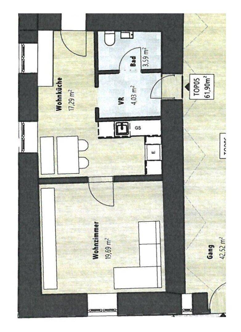 Grundriss einer Wohnung mit Wohnküche, Wohnzimmer, Bad und Vorraum.