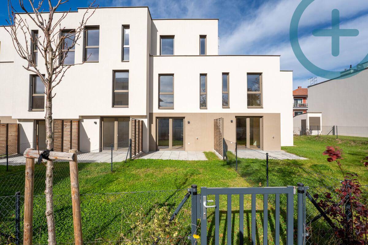 Familienglück auf drei Etagen – modernes Reihenhaus mit Garten - Ansicht 2