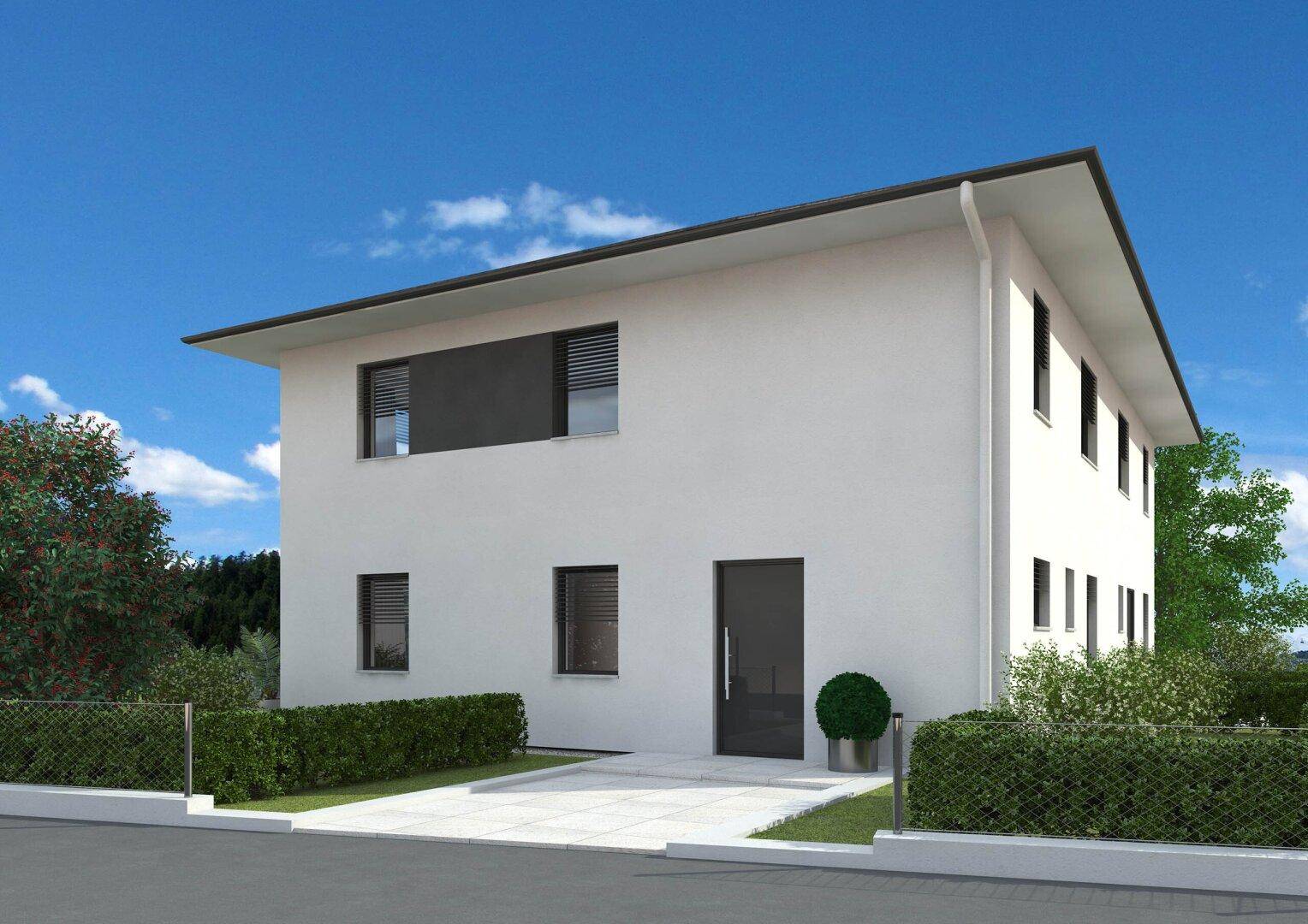 Vorderansicht einer modernen Doppelhaushälfte mit weißer Fassade, großem Eingang und gepflasterter Zufahrt.
