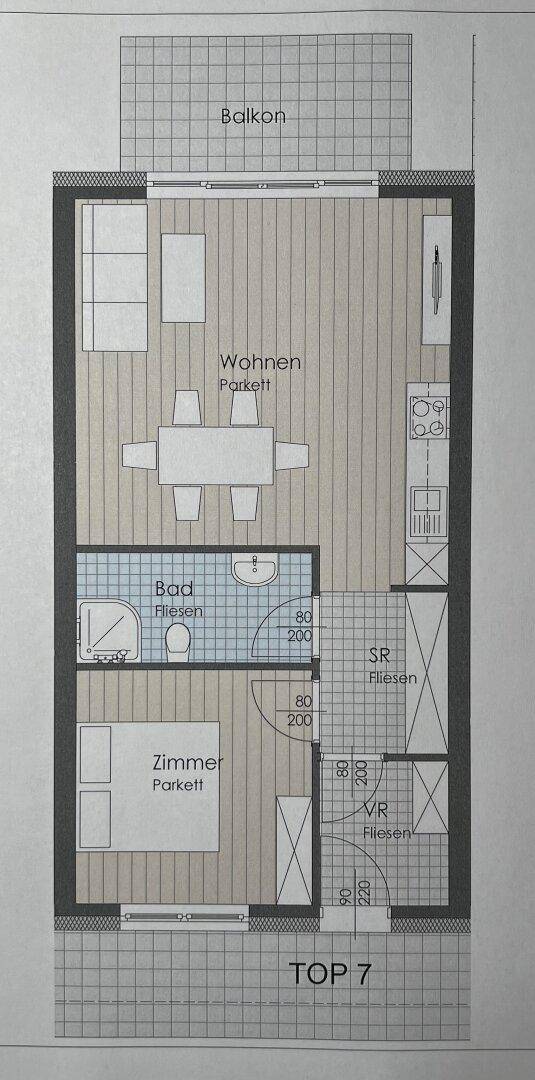 Grundriss einer Wohnung mit offenem Wohnbereich, Schlafzimmer, Bad und Balkon.