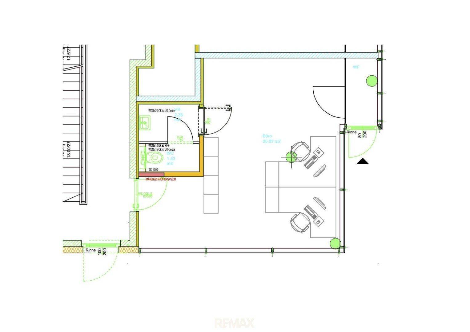 Grundriss einer Gewerbefläche mit offenem Bereich, zwei Arbeitsplätzen und einer separaten Toilette.