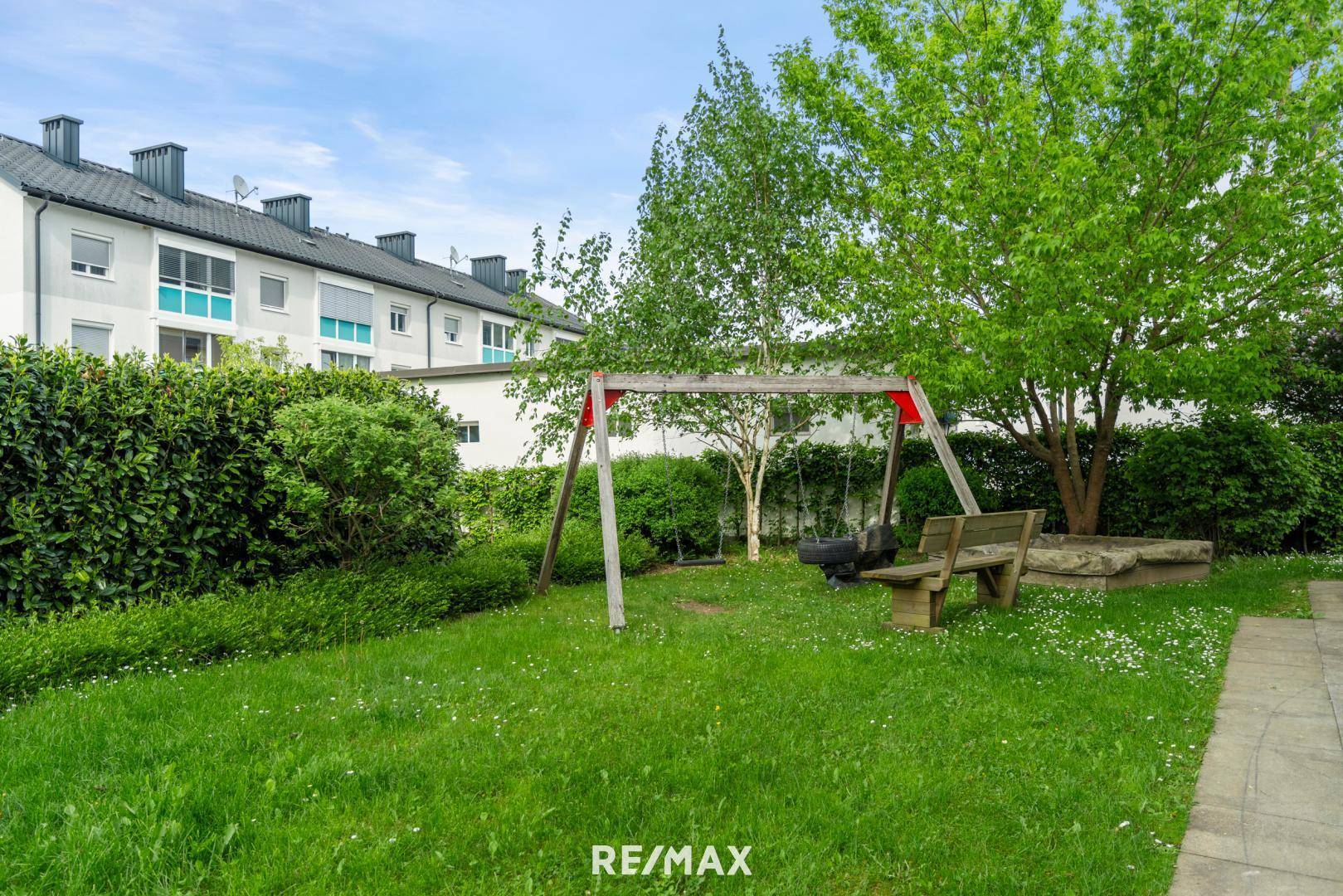Gemeinschaftsgarten mit Spielplatz