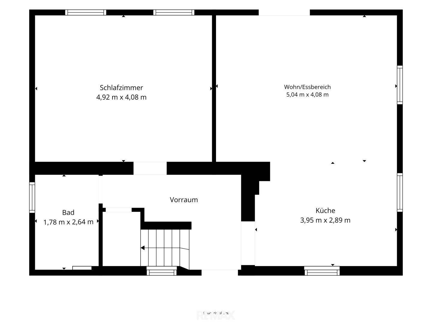 Grundriss des Erdgeschosses mit Schlafzimmer, Bad, Vorraum, Wohn-/Essbereich und Küche.