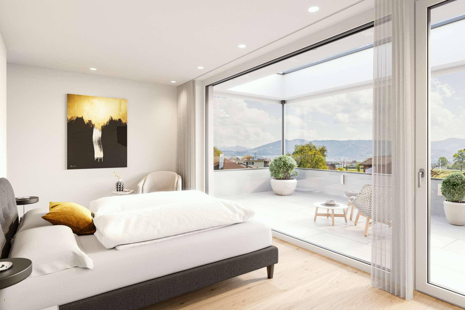 Helles Schlafzimmer mit Zugang zu einer großen Terrasse und Bergblick.