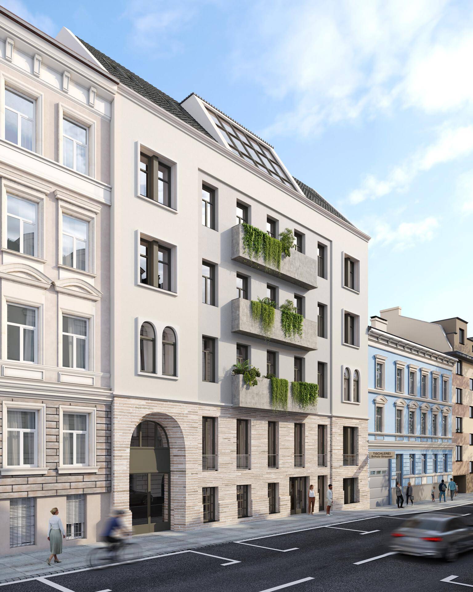 Vorderansicht eines eleganten Wohnhauses mit begrünten Balkonen und klassischer Architektur.