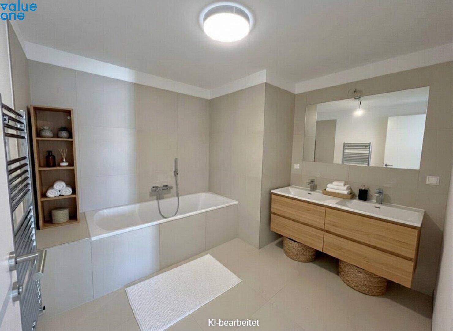 Geräumiges Badezimmer mit Badewanne, Doppelwaschbecken und modernen Holzunterschränken.