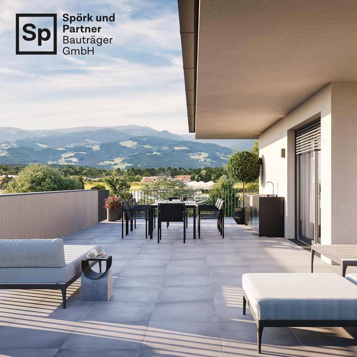 Großzügige Dachterrasse mit modernen Loungemöbeln und weitem Blick auf die umliegende Berglandschaft.