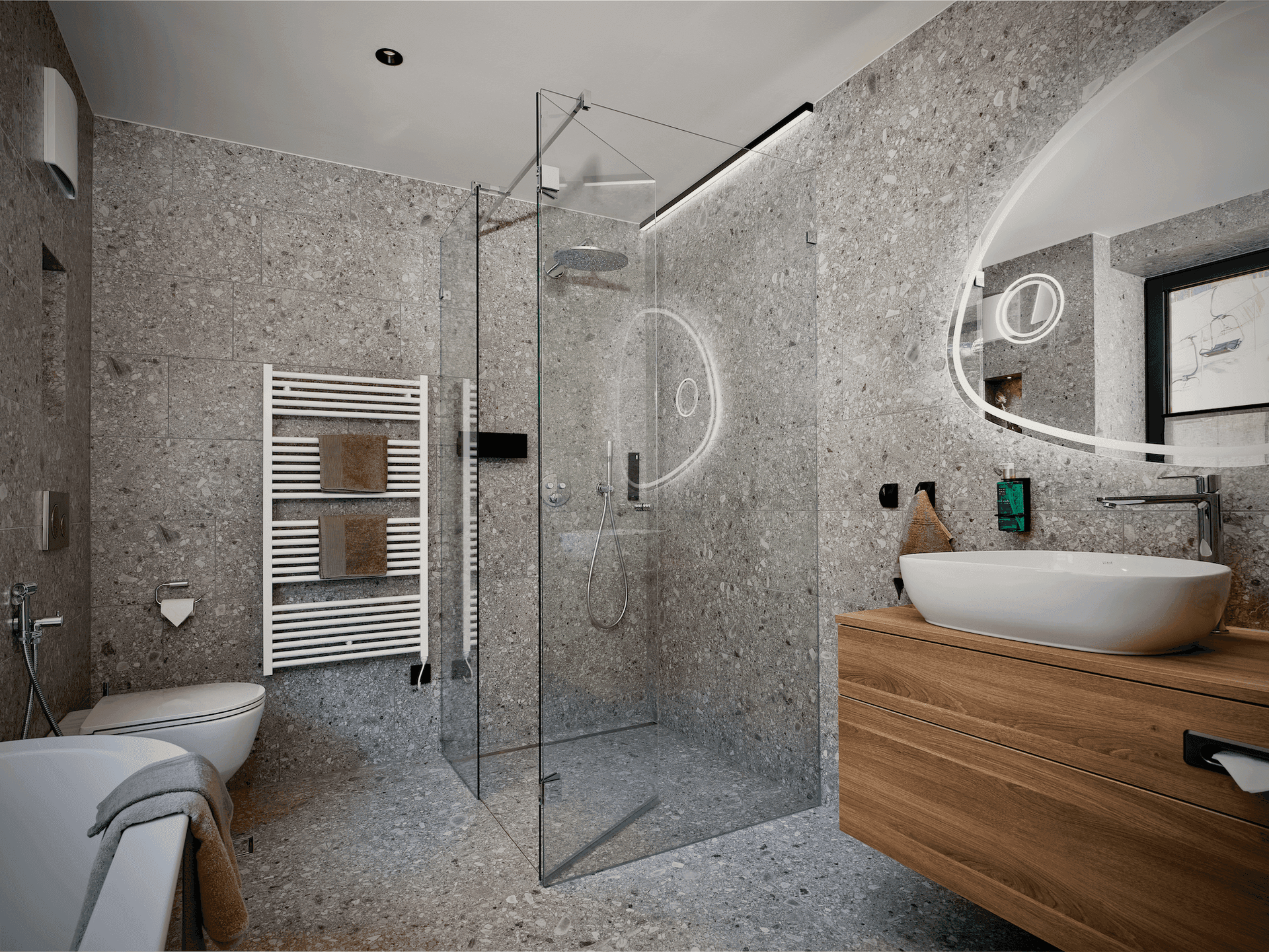 Modernes Badezimmer mit grauen Fliesen, begehbarer Dusche, Holzwaschtisch und beleuchtetem Rundspiegel.