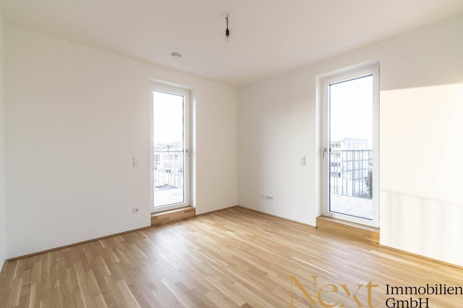 Schlafzimmer I mit Zugang zur Terrasse