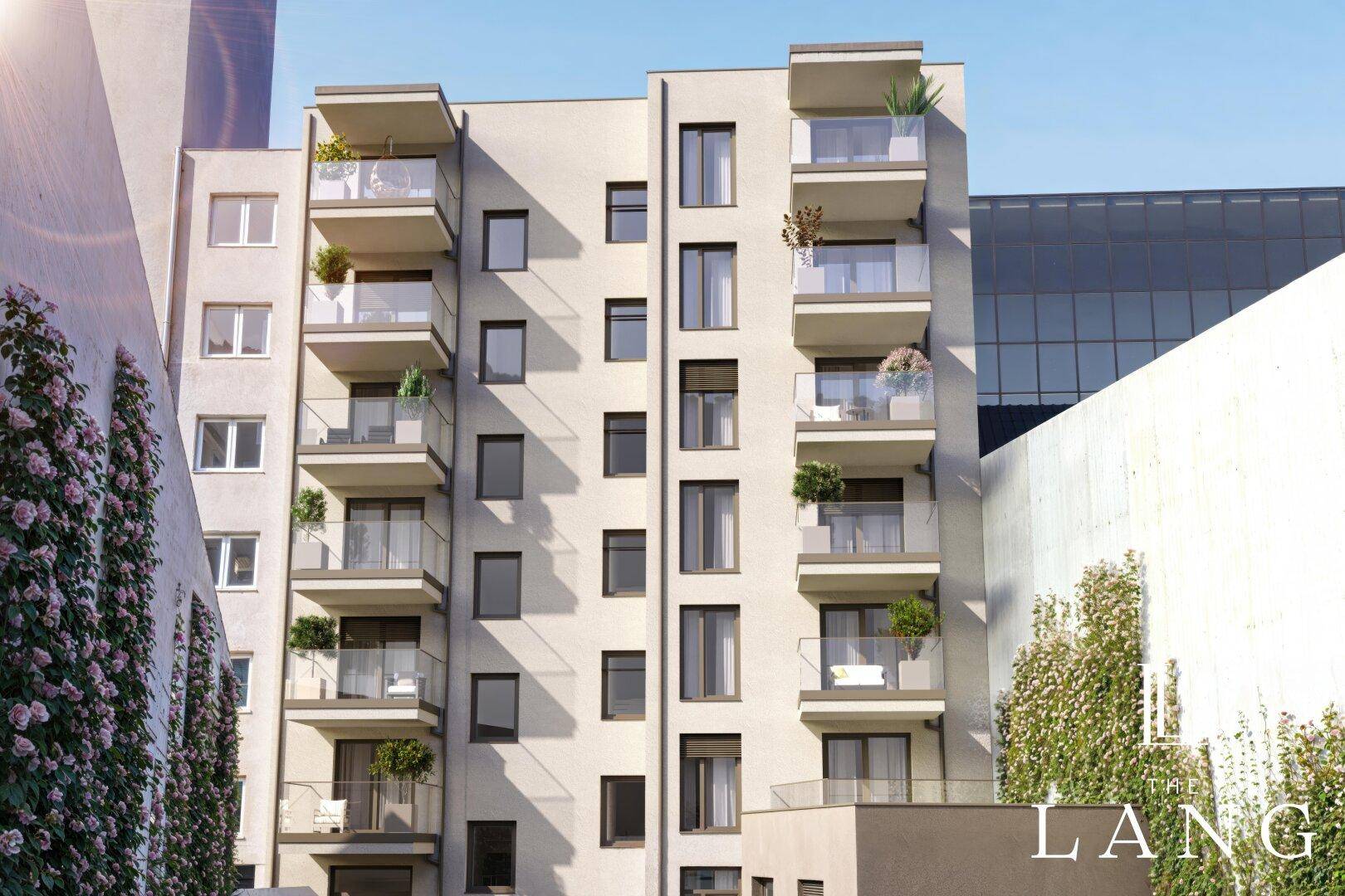 Mehrstöckiges Wohngebäude mit zahlreichen Balkonen und moderner Architektur in städtischer Lage.