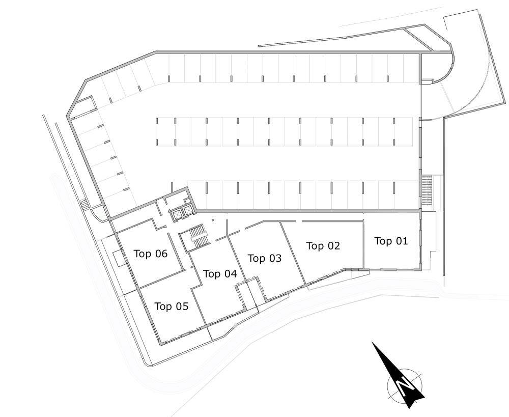 Grundriss des Untergeschosses mit Tiefgarage und mehreren Wohneinheiten.