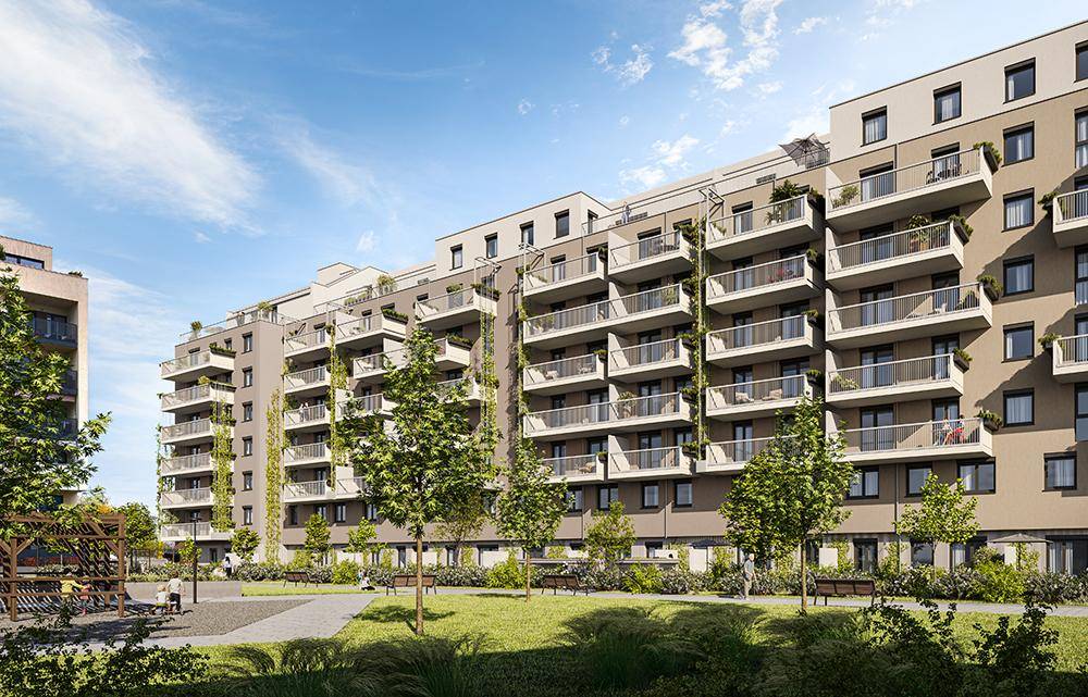 Moderne Wohnanlage mit begrüntem Innenhof, Balkonen und Sitzgelegenheiten am Tag.