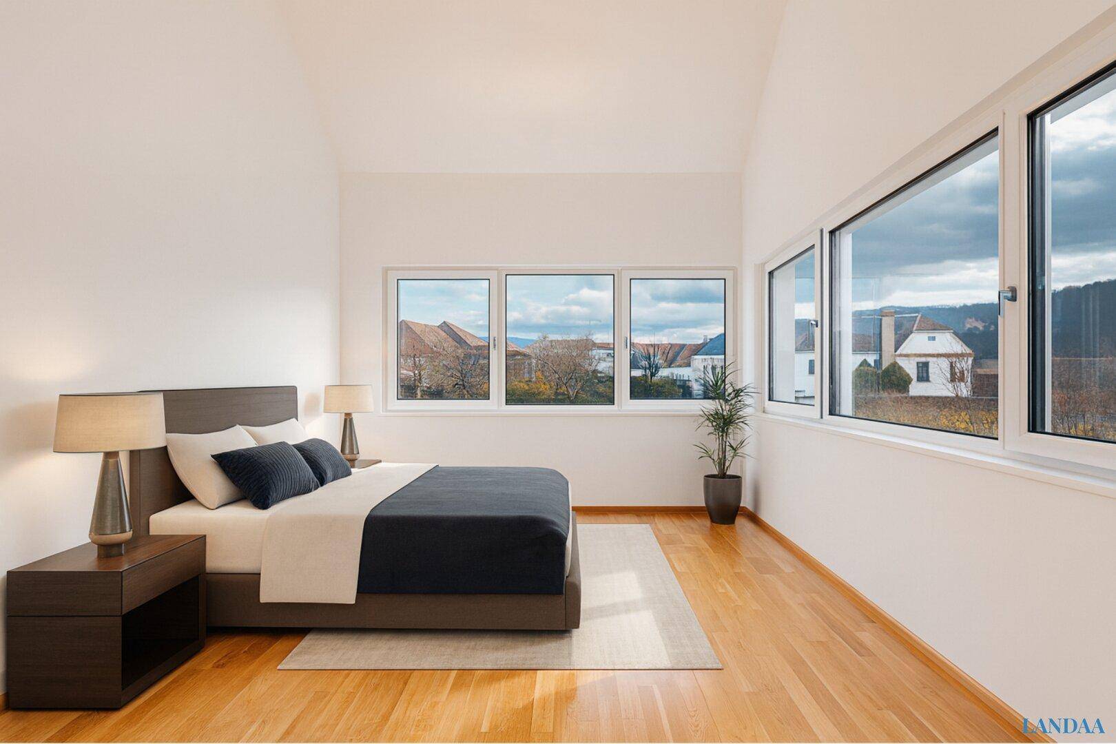 Gemütliches Schlafzimmer mit Holzboden, Dachschräge und großen Fenstern für viel Tageslicht.