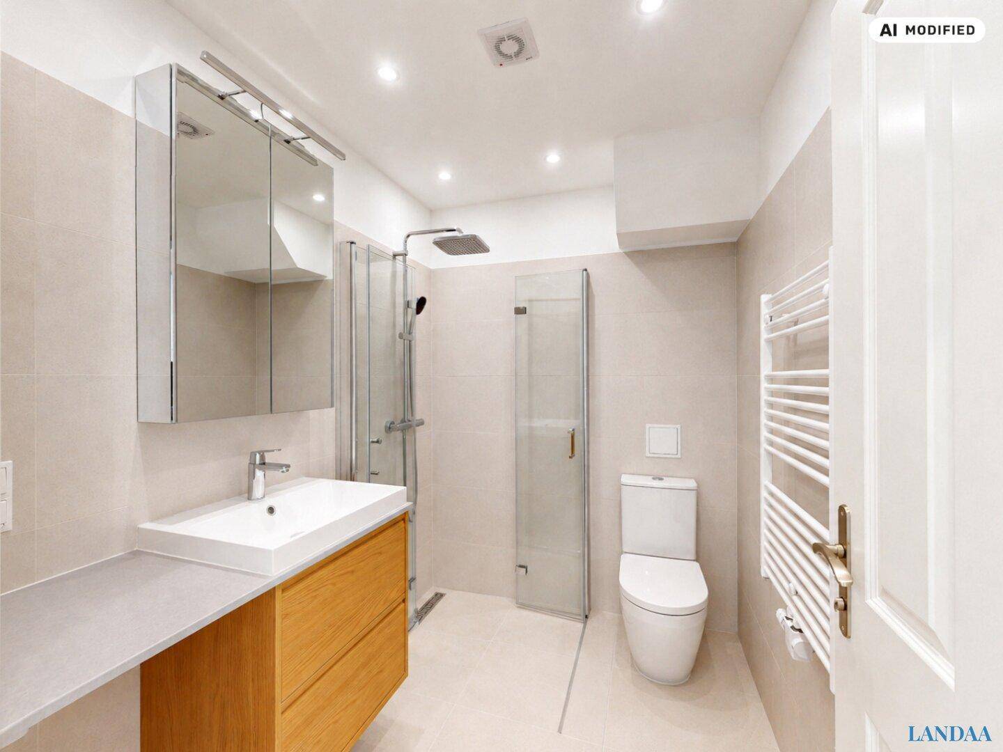 Modernes Badezimmer mit begehbarer Dusche, Waschtisch, Wand-WC und beheiztem Handtuchhalter.