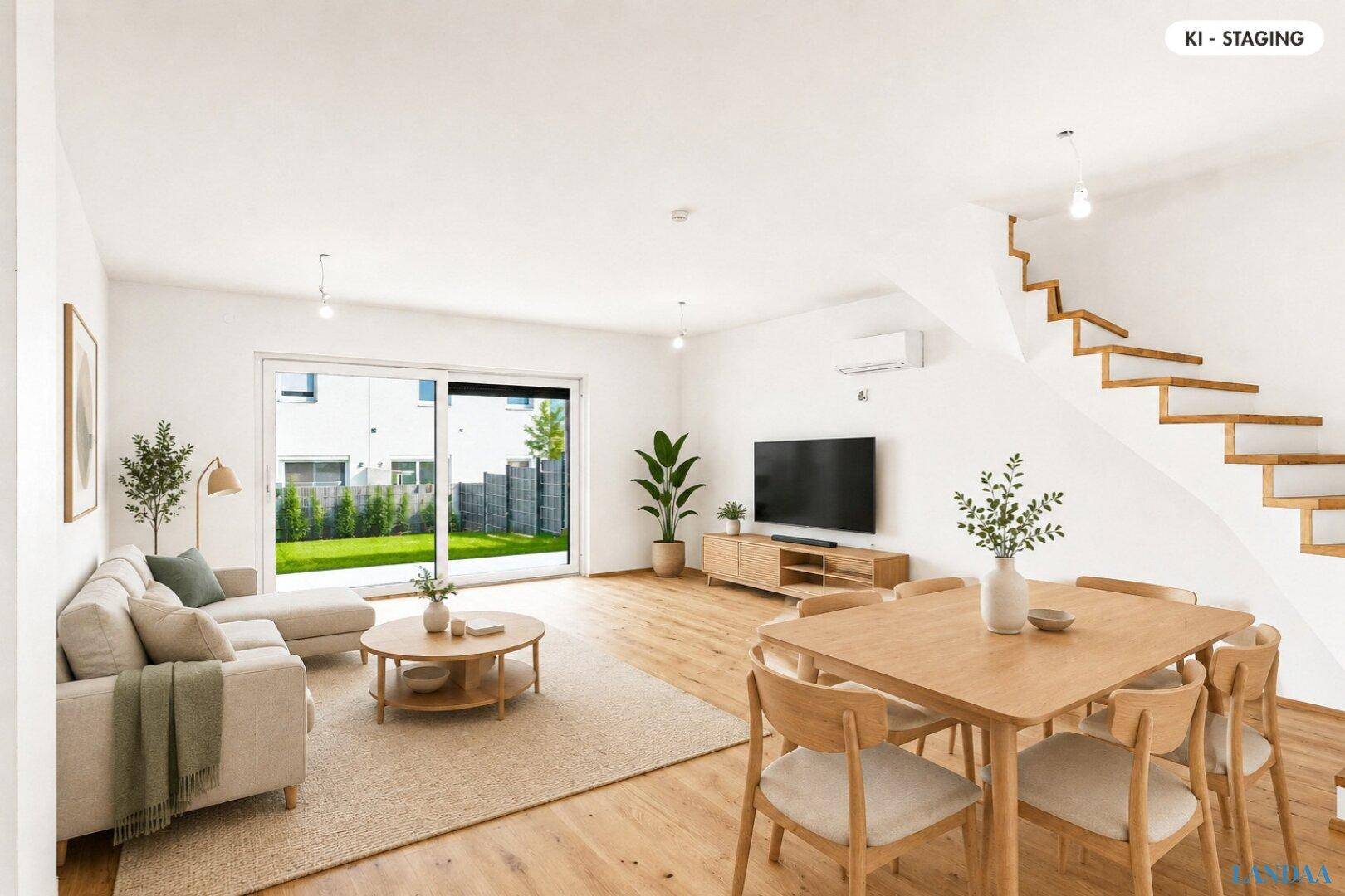 Helles, offenes Wohn- und Esszimmer mit Holzboden, Zugang zum Garten und moderner Einrichtung.