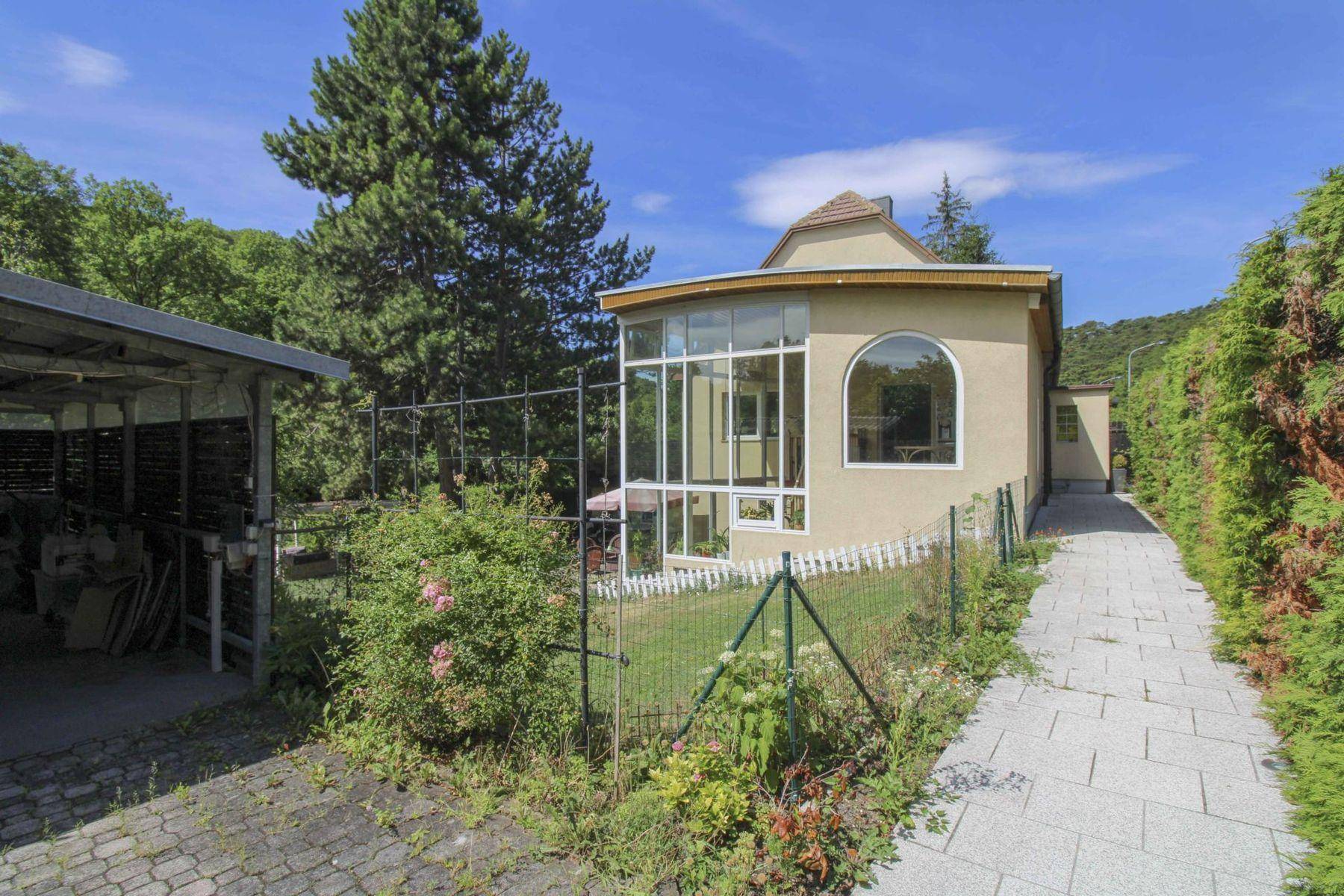 Carport mit Haus