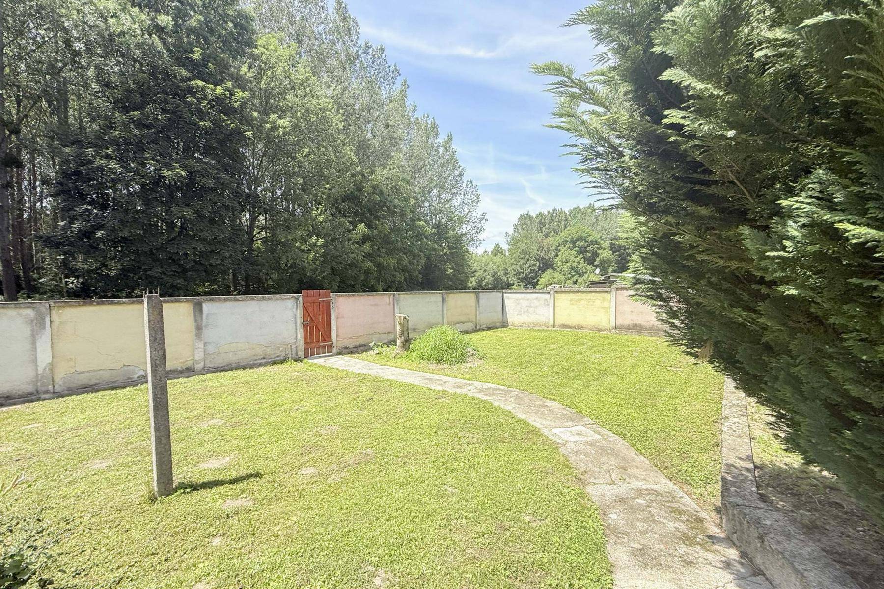 Einfamilienhaus mit großem Garten, Garage und Ausbaupotenzial - Ansicht 4