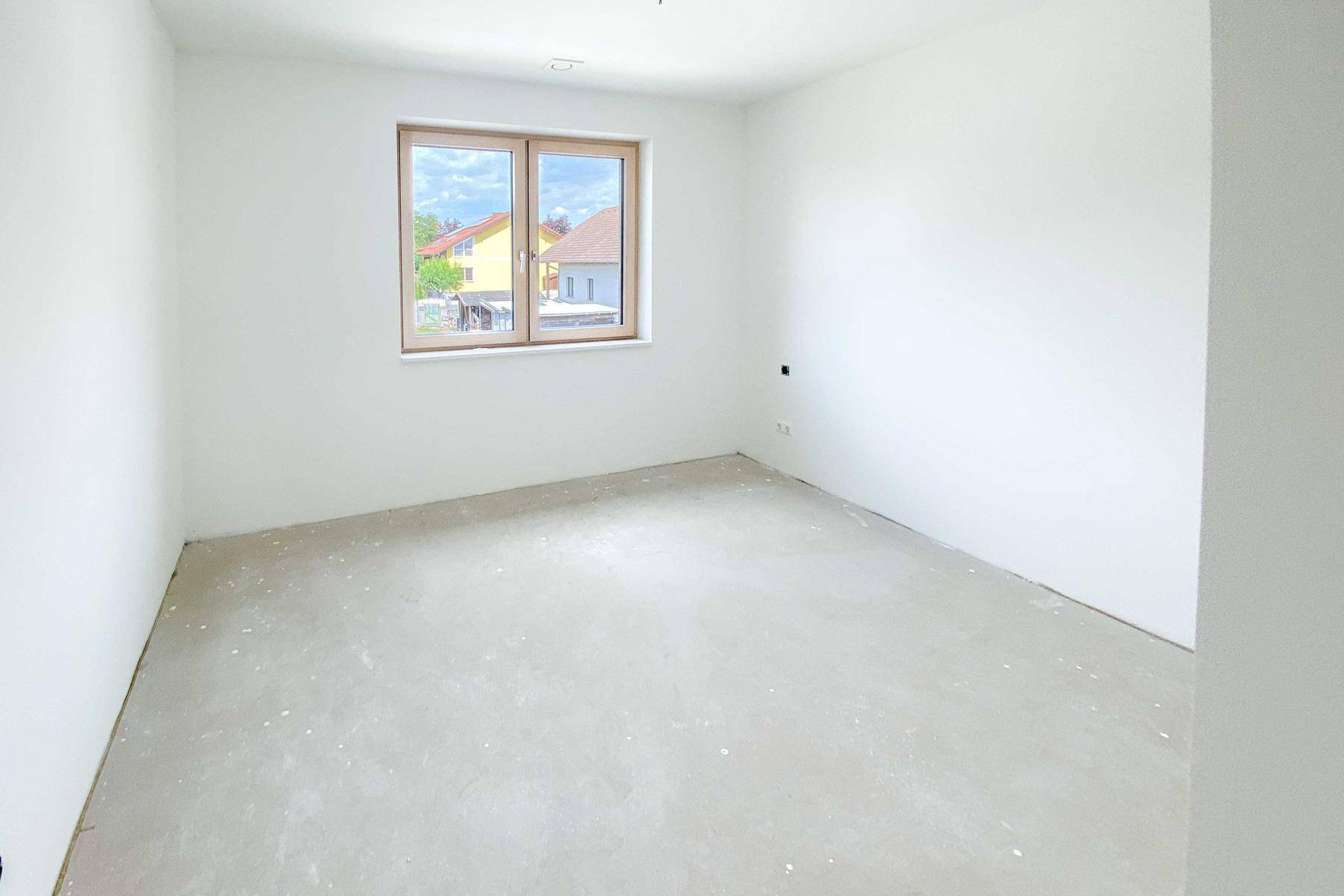 Modernes Reihenhaus in Spillern – belagsfertiger Erstbezug mit Garten - Ansicht 2