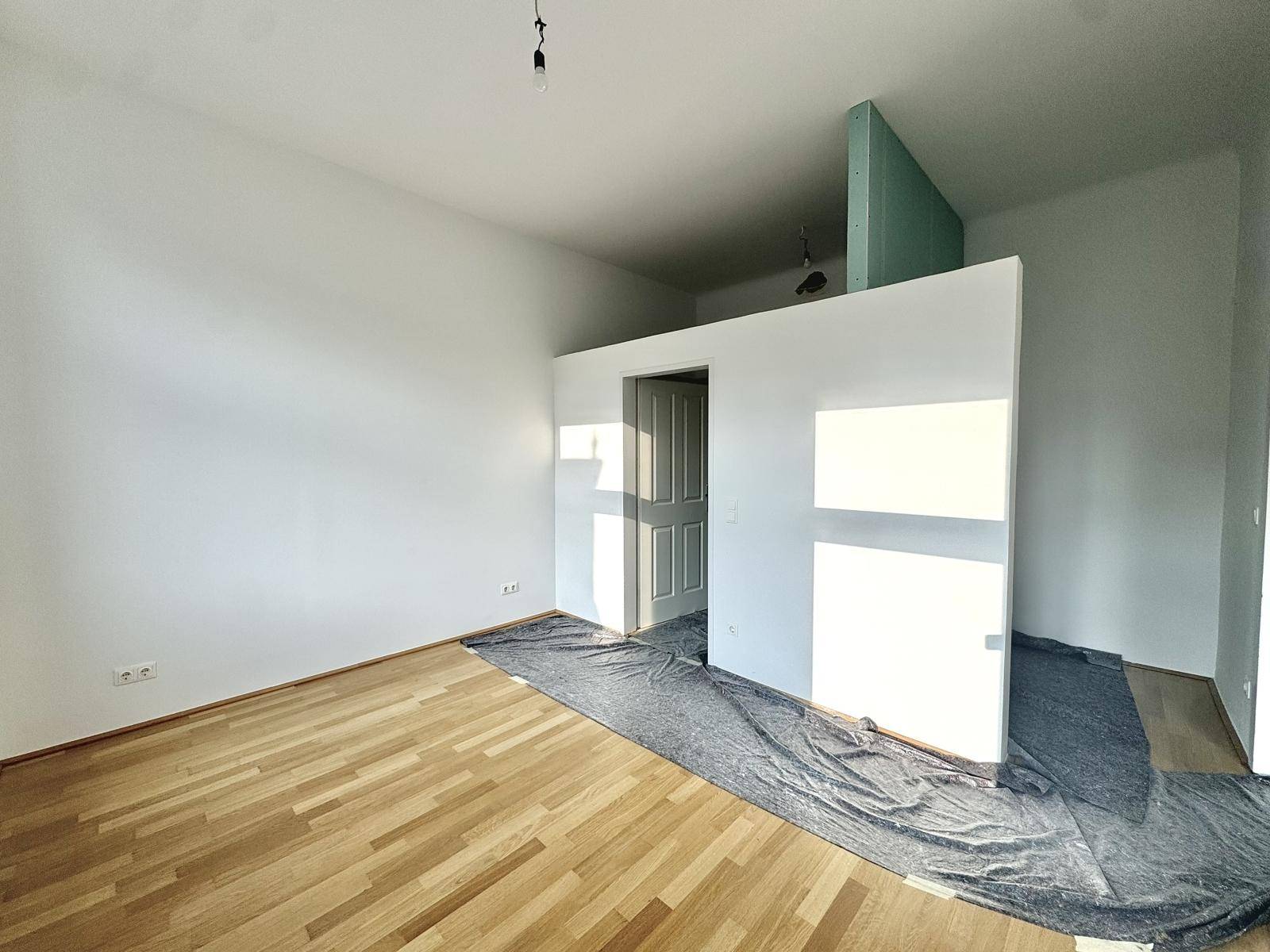 Schlafzimmer mit Badezimmer