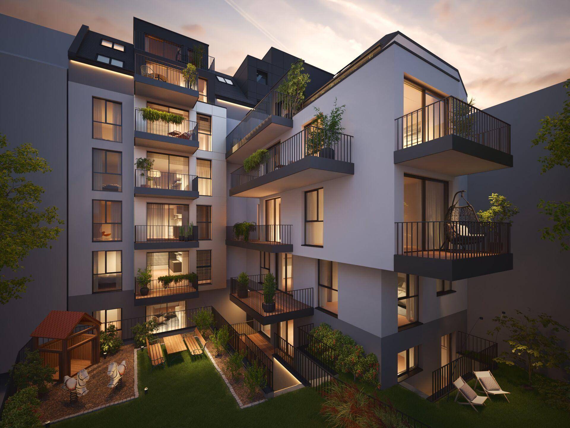 Abendliche Ansicht des Innenhofs mit Gemeinschaftsgarten, Spielplatz und Sitzgelegenheiten.