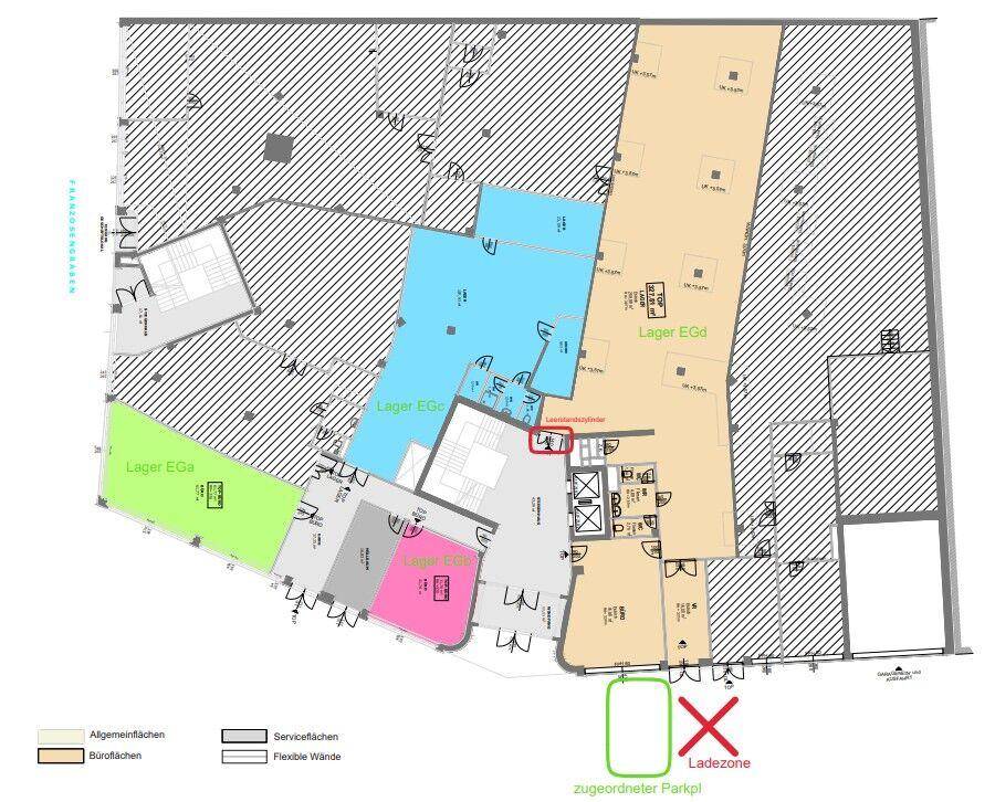 Übersichtlicher Grundriss mit farblich markierten Lager- und Büroflächen sowie flexiblen Wänden und Parkplätzen.
