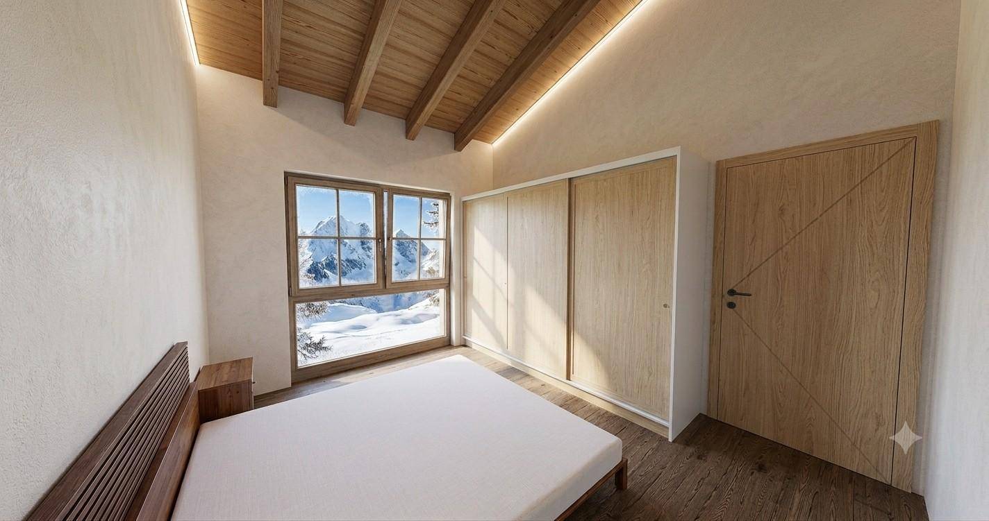 Helles Schlafzimmer mit Holzbalkendecke, Einbauschränken und Panoramablick auf die verschneiten Berge.