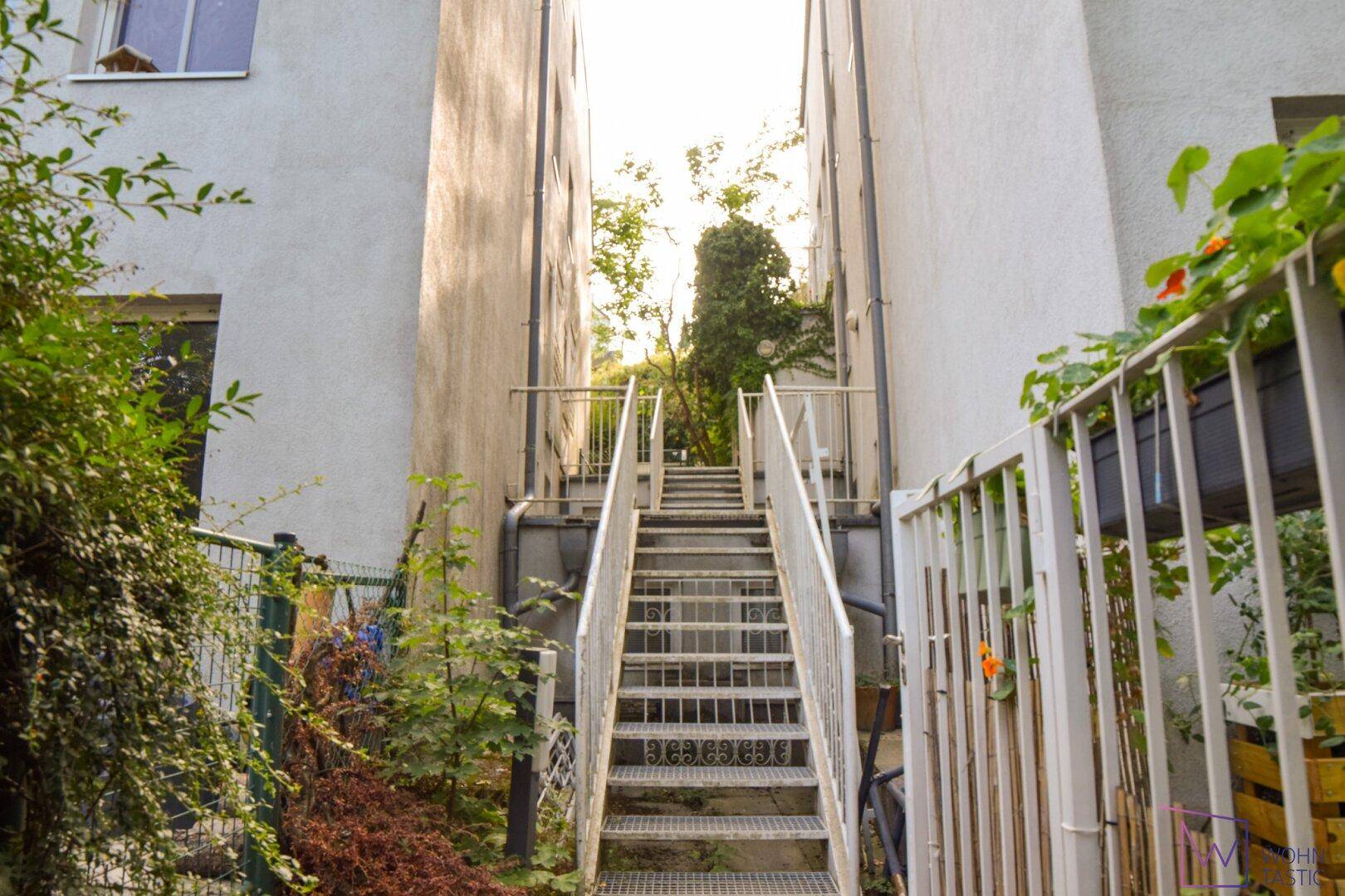 Weg vom Gemeinschaftsgarten Richtung Eingangsbereich.