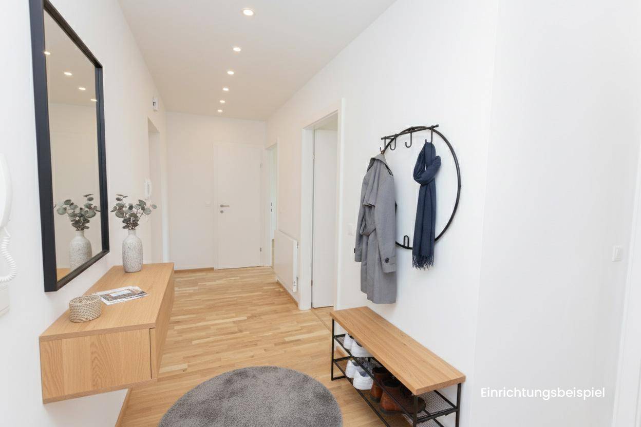 Modern eingerichteter Flur mit Holzparkett, großem Spiegel und Garderobe.