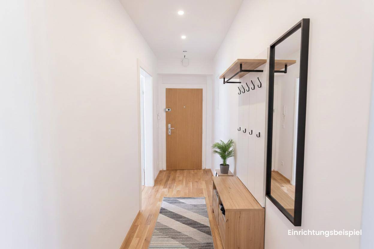 Freundlicher Flur mit Holzboden und moderner Garderobe, der einen einladenden Eingangsbereich schafft.