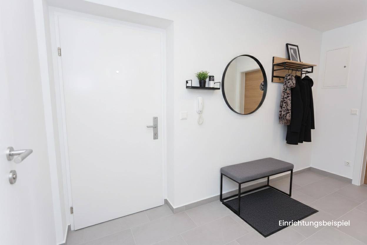 Modern eingerichteter Flur mit Spiegel, Sitzbank und Garderobe, als Einrichtungsbeispiel.
