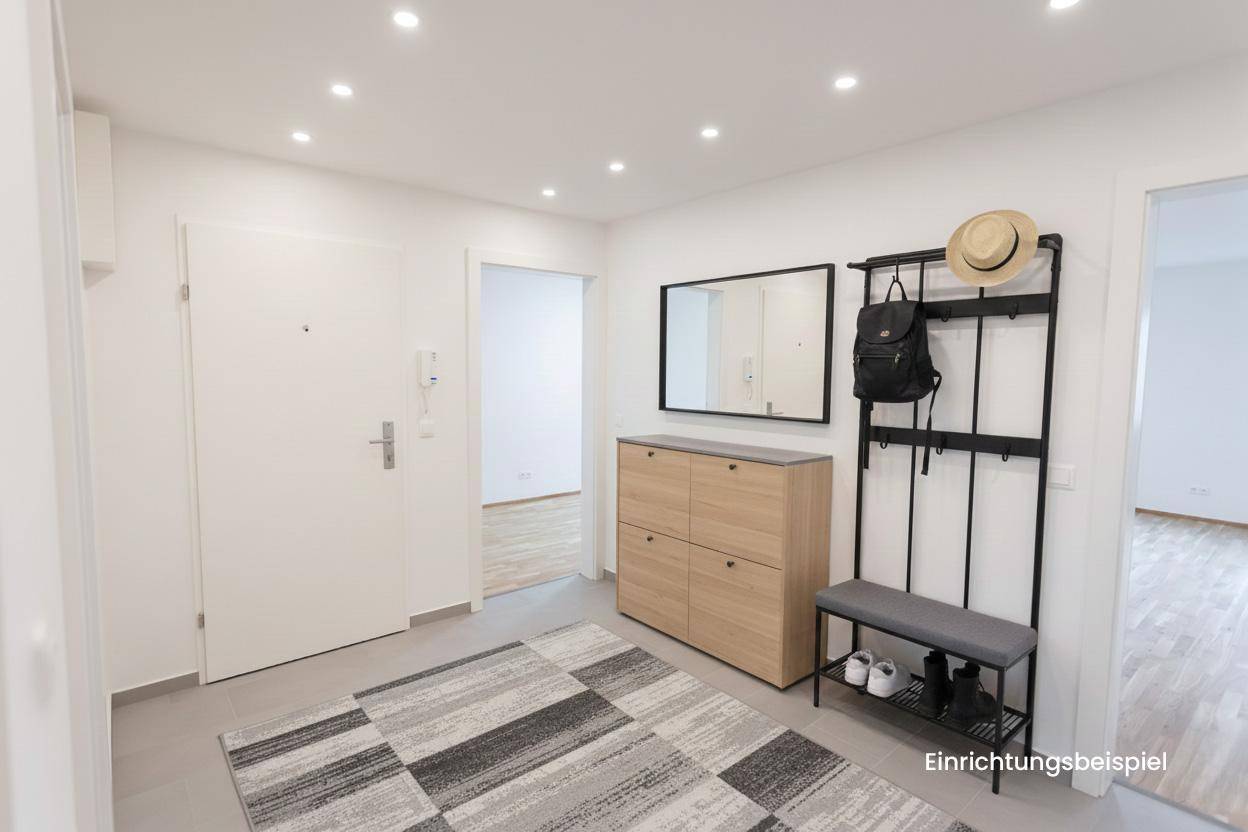 Freundlicher Flur mit moderner Einrichtung, Schuhschrank, Spiegel und Garderobe, als Einrichtungsbeispiel.