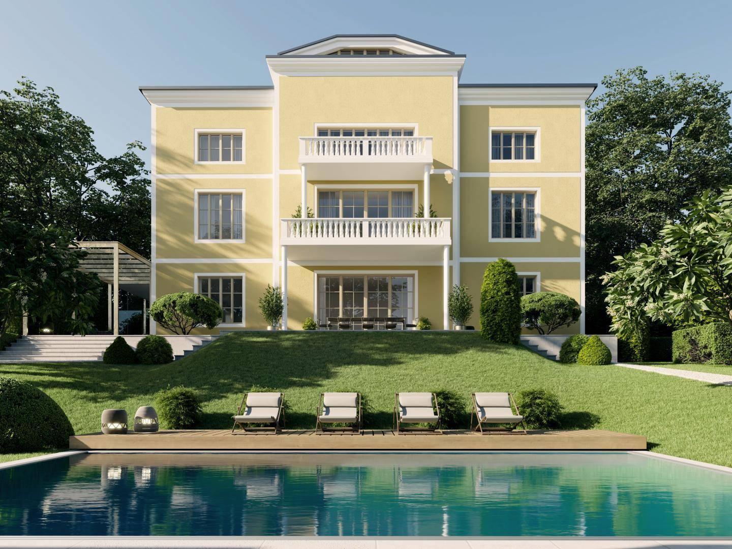 Elegante gelbe Villa mit mehreren Balkonen, umgeben von einem gepflegten Garten und einem großen Pool.
