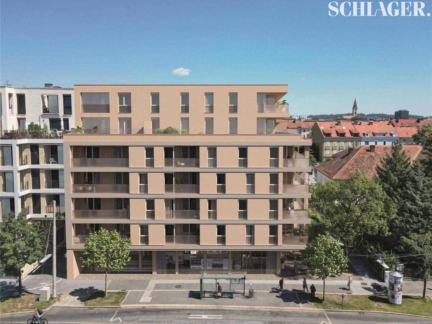 Ansicht des modernen Wohngebäudes von der Straße mit großen Fenstern und Balkonen.