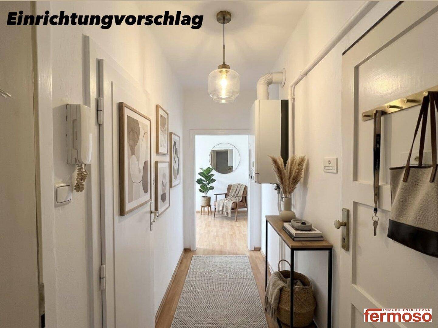 Einrichtungsvorschlag für einen einladenden Flur mit moderner Dekoration und praktischer Ablagefläche.
