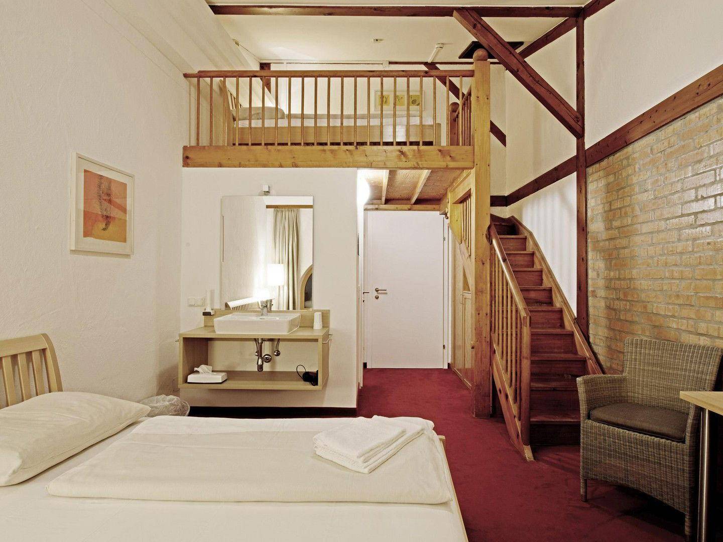 Hotelzimmer mit Galerie